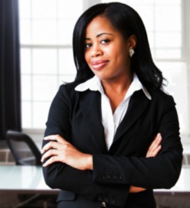 A confident African American businesswoman in her office.
